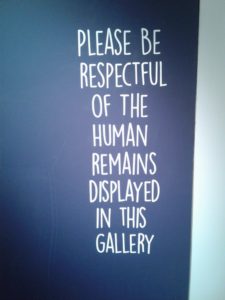 Sign outside of the New Walk's new Egypt gallery reading "Please be respectful of the human remains displayed in this Gallery"