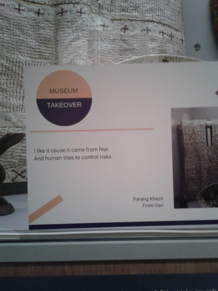 Museum Takeover label reading "I like it cause it came from fear. And human tries to control Risks." written by Parang Khezri from Iran